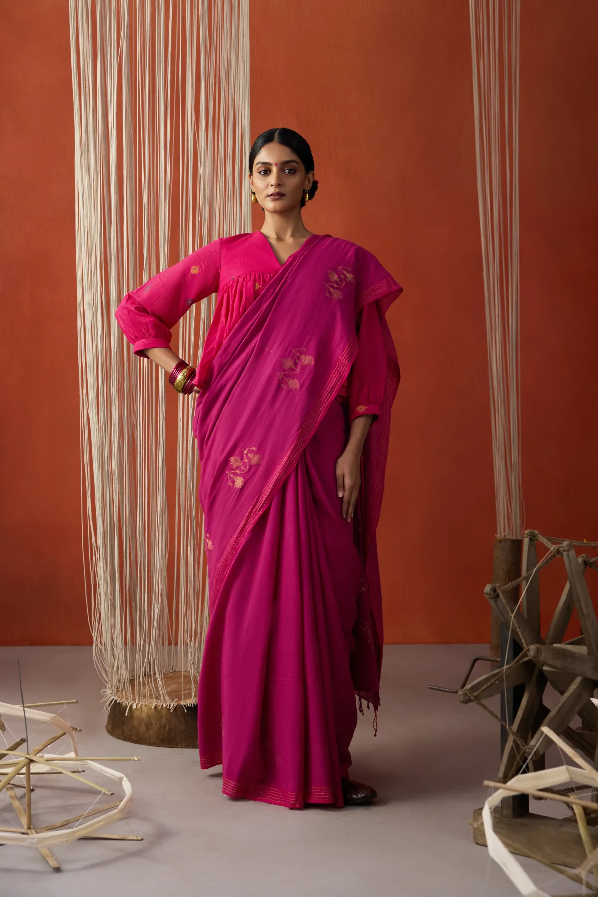 Rajankani, a pomegranate-red cotton Jamdani saree